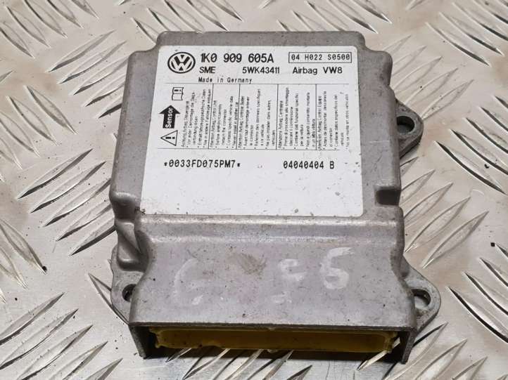 1K0909605A Volkswagen Golf V Oro pagalvių valdymo blokas