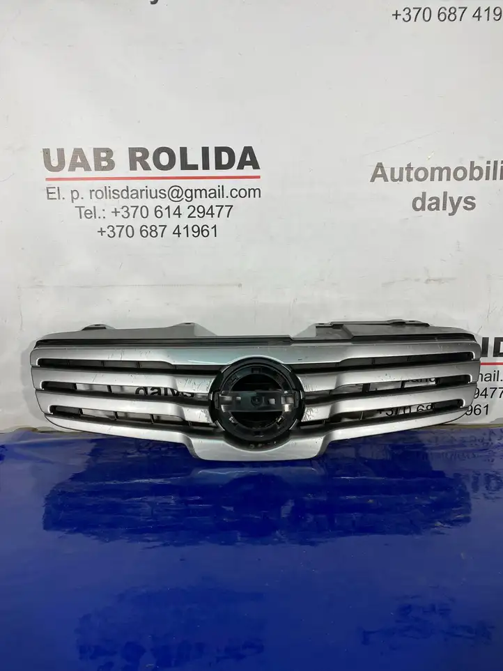 Nissan Qashqai (2006 - 2010) 62310EY10A Верхняя решетка радиатора — фото 1