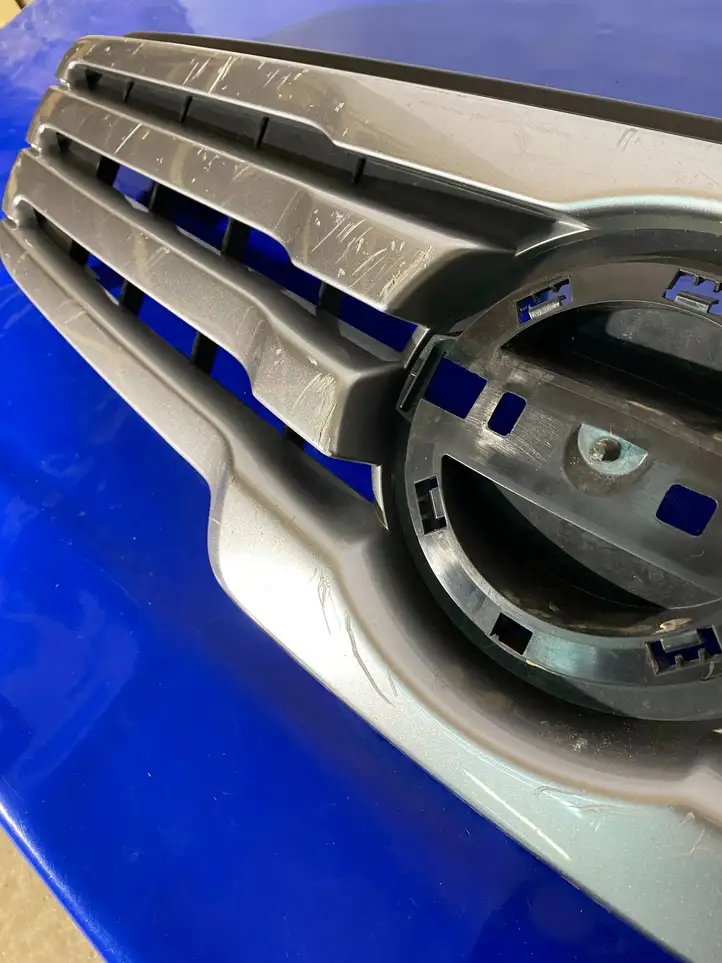Nissan Qashqai (2006 - 2010) 62310EY10A Верхняя решетка радиатора — фото 11