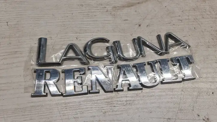Renault Laguna II (2001 - 2005) Эмблема производителя — фото 3