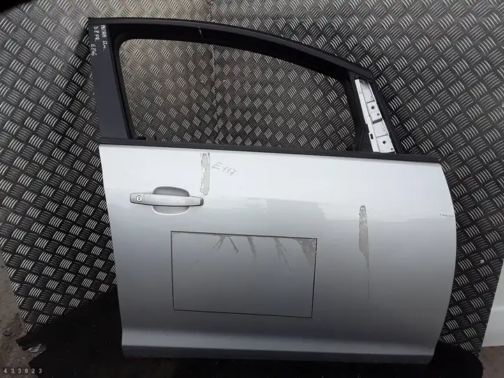 Opel Astra (2009 - 2012)   Дверь