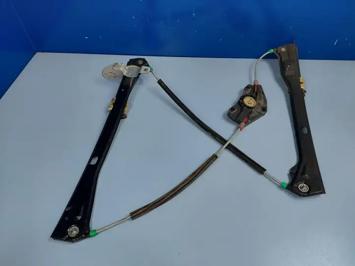 Volkswagen Golf V (2003 - 2009)  E038074012 Механизм для электрического подъема окон передней двери (без двигателя)