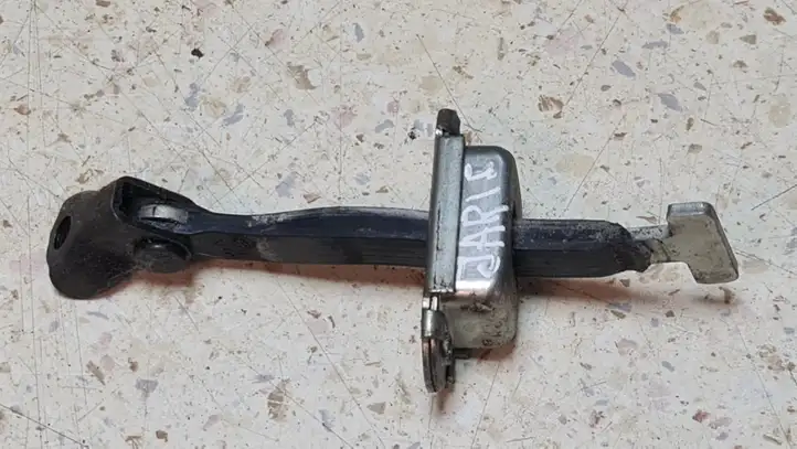Toyota Yaris (2005 - 2009) Ограничитель задней двери — фото 2