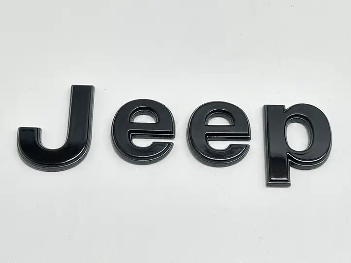 Jeep Grand Cherokee WL (2021 - ) Эмблема модели на переднюю дверь — фото 1