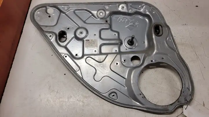 Ford Focus (1998 - 2004) 4M51A24995CE Механический стеклоподъемник задней двери — фото 1