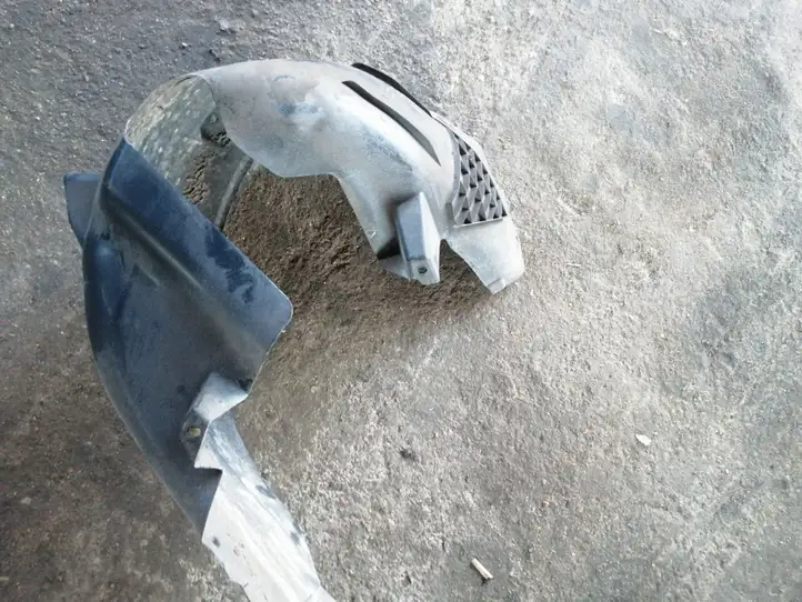 Opel Astra (2009 - 2012)   Задний подкрылок