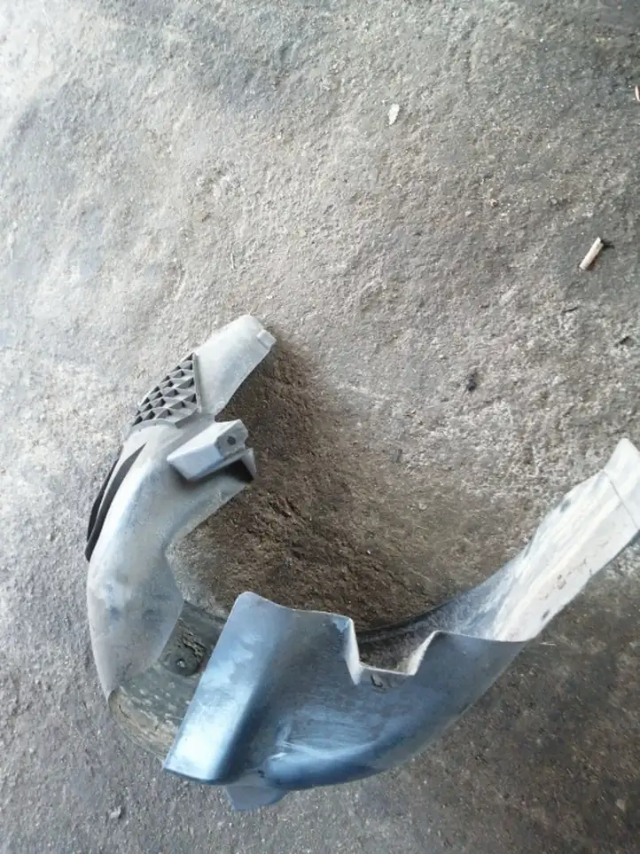 Opel Astra (2009 - 2012)   Задний подкрылок