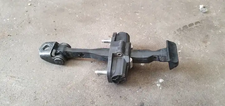 Ford Fiesta (2013 - 2017) Ограничитель задней двери — фото 1