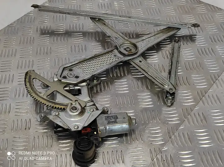 Toyota Yaris (1999 - 2003) 8571052030 Электростеклоподъемник передний (комплект) — фото 1