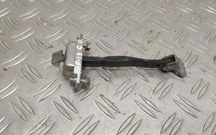 Toyota Yaris (2012 - 2014) Ограничитель задней двери — фото 1