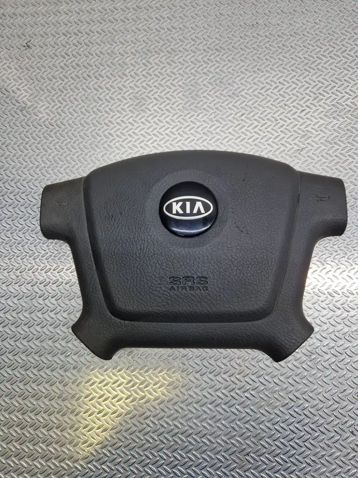 Kia Cerato (2003 - 2007) 569002F010 Подушка безопасности руля — фото 1