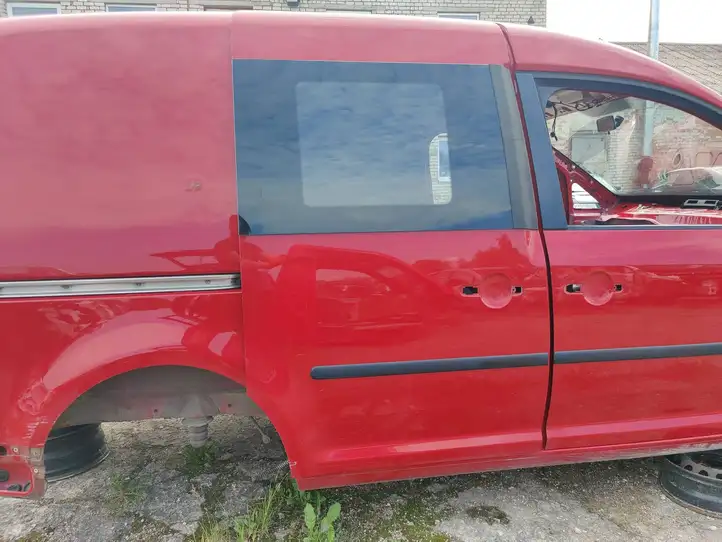 Volkswagen Caddy (2010 - 2015) Боковая раздвижная дверь — фото 1