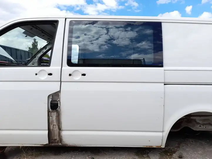 Volkswagen Transporter - Caravelle T5 (2009 - 2015) Боковая раздвижная дверь — фото 1