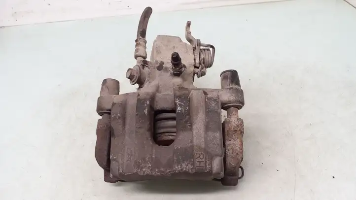 Nissan Primera (2001 - 2008) Тормозной суппорт задний — фото 3