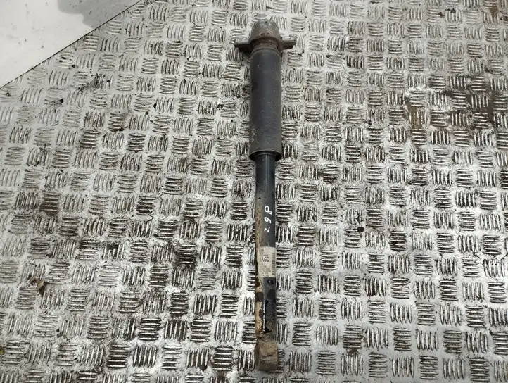 Opel Astra (2009 - 2012)   Задний амортизатор с пружиной