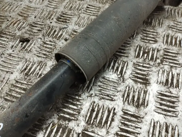 Opel Astra (2009 - 2012)   Задний амортизатор с пружиной