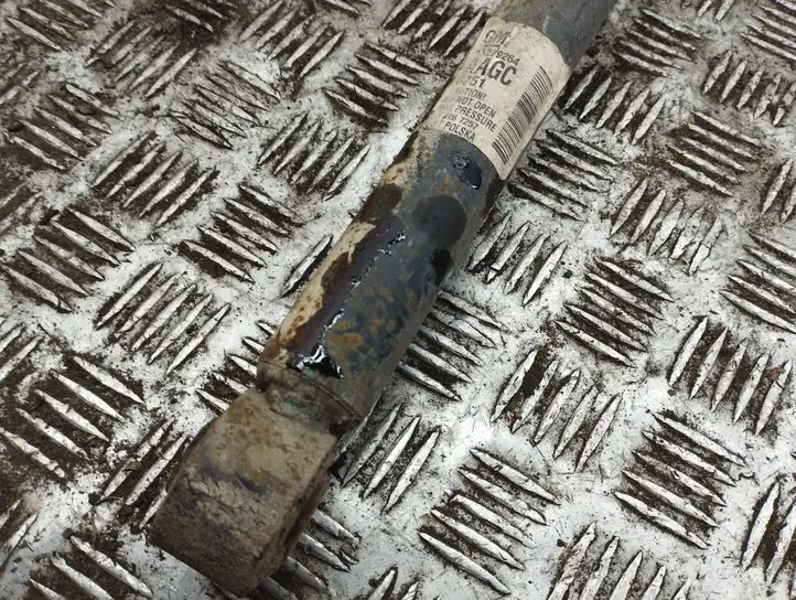 Opel Astra (2009 - 2012)   Задний амортизатор с пружиной