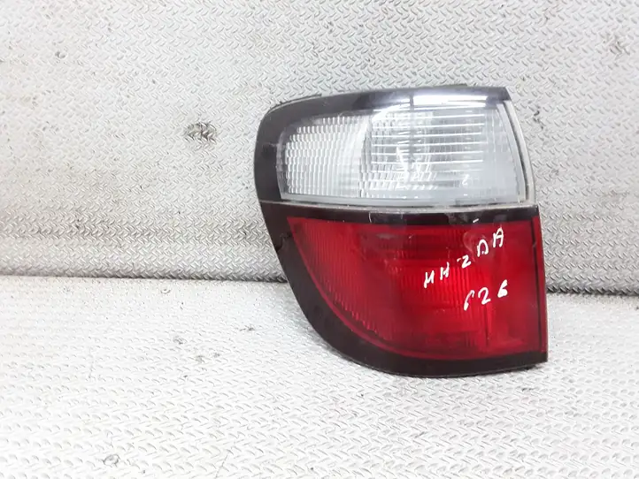 Mazda 626 (1999 - 2002) R2265L Задний фонарь в кузове — фото 1