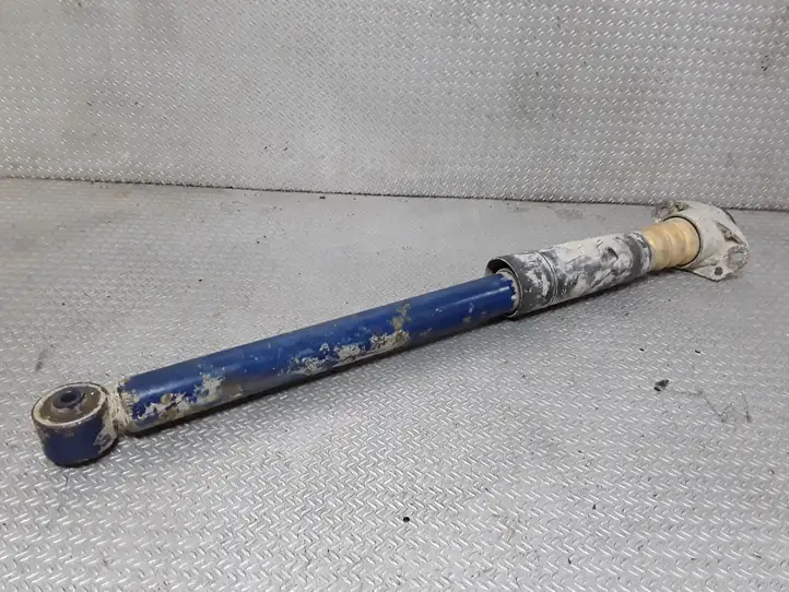 Volkswagen Golf IV (1998 - 2005)   Задний амортизатор с пружиной