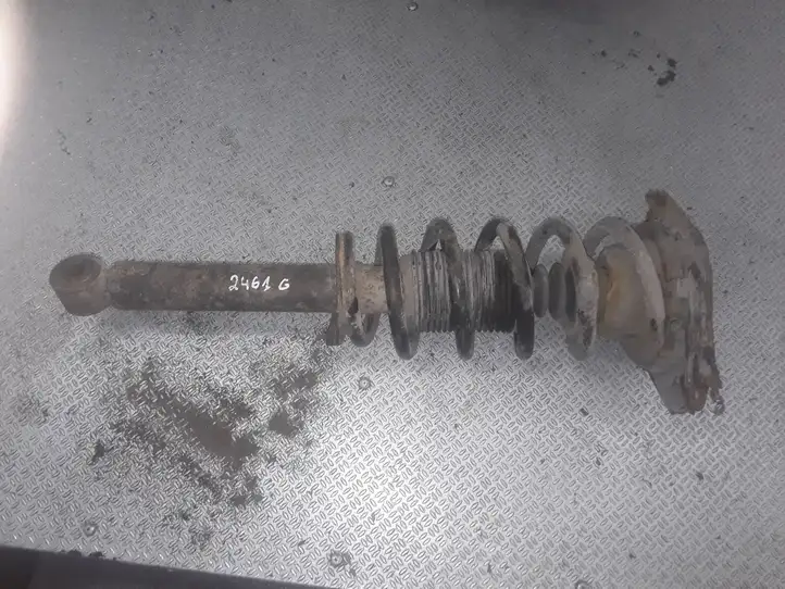 Nissan Primera    Задний амортизатор с пружиной