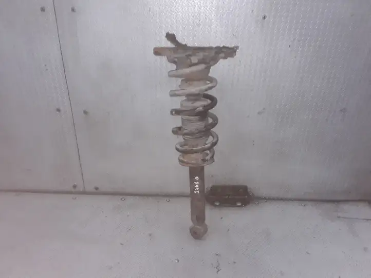 Nissan Primera    Задний амортизатор с пружиной