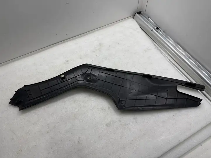Tesla Model S (2012 - 2016) 100632700E Обшивка бардачка — фото 3