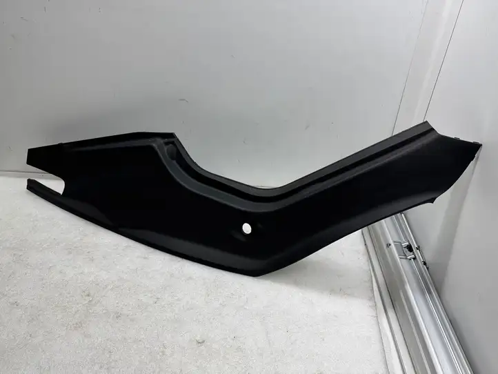 Tesla Model S (2012 - 2016) 100632800E Обшивка бардачка — фото 1