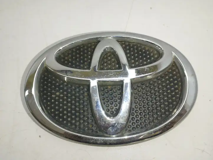 Toyota Corolla Verso AR10 (2004 - 2009) 753010F010 Эмблема автомобиля — фото 1