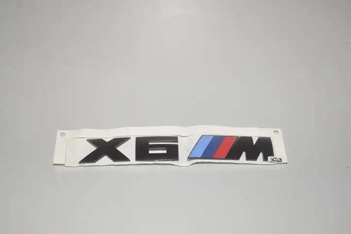 BMW X6M G06 F96 (2019 - ) Эмблема производителя — фото 1
