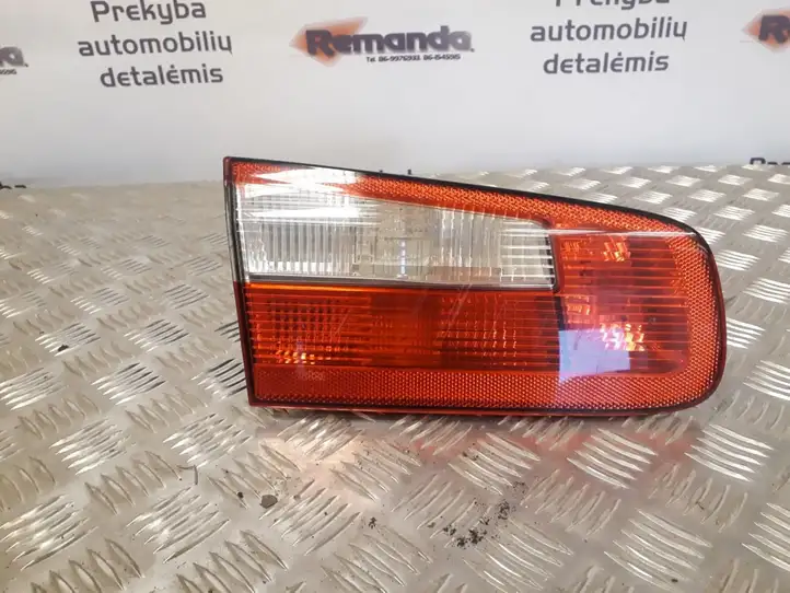 Renault Laguna II (2001 - 2005) Задний фонарь в крышке багажника — фото 1