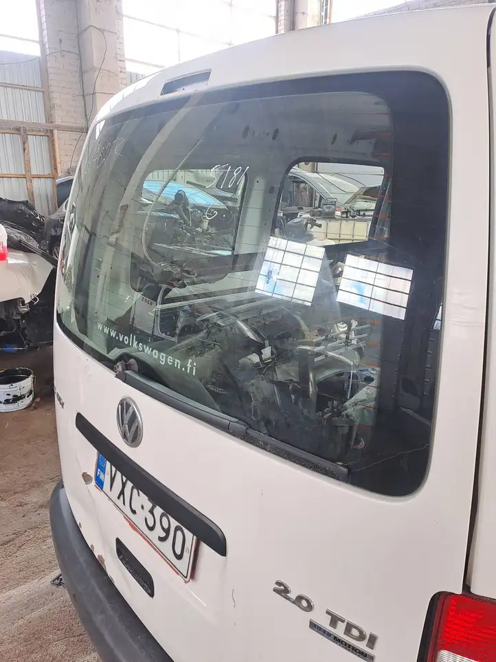 Volkswagen Caddy (2010 - 2015) Nocode Открывающееся стекло крышки багажника — фото 2