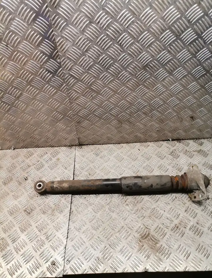 Volkswagen PASSAT B7 (2011 - 2014)   Задний амортизатор с пружиной