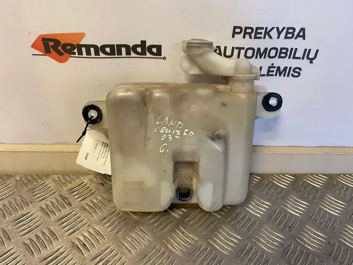 Toyota Land Cruiser (HDJ90) (1996 - 2002) 860141311 Бачок омывателя стекла — фото 1