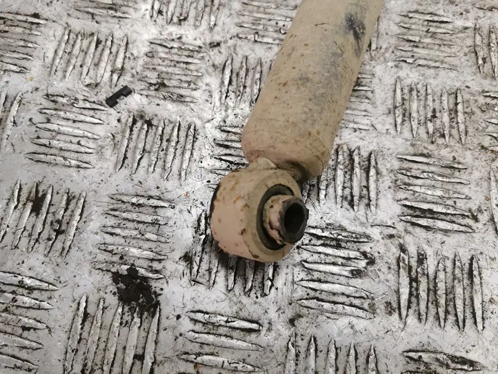 Chrysler PT Cruiser (2000 - 2010)   Задний амортизатор с пружиной