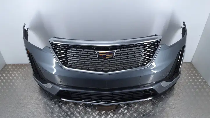 Cadillac XT6 (2019 - ) Передний бампер — фото 1