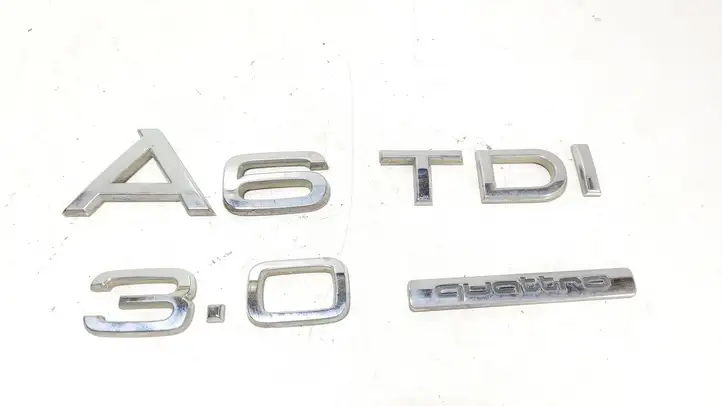 Audi A6 S6 C6 4F (2004 - 2008) Эмблема производителя — фото 1