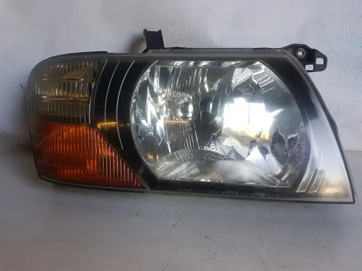 Mitsubishi Pajero (1999 - 2003) 10087419 Передняя фара — фото 1