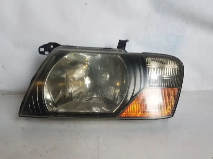 Mitsubishi Pajero (1999 - 2003) 10087419 Передняя фара — фото 1