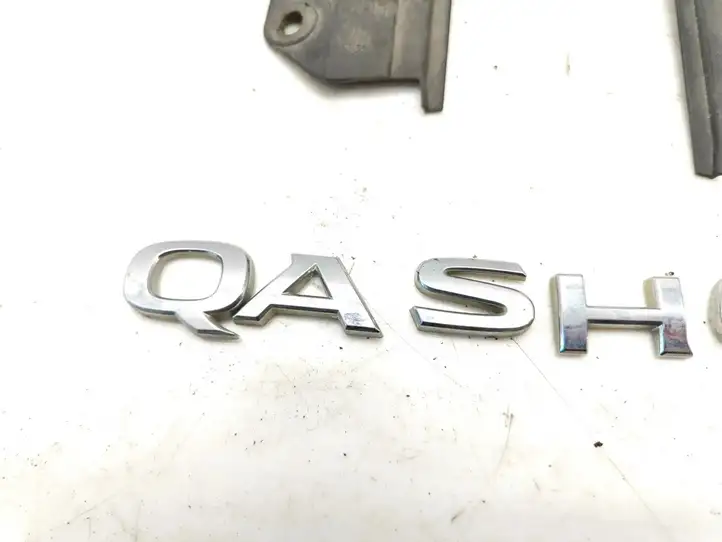 Nissan Qashqai (2013 - 2017) 908074EA1B Эмблема производителя — фото 3