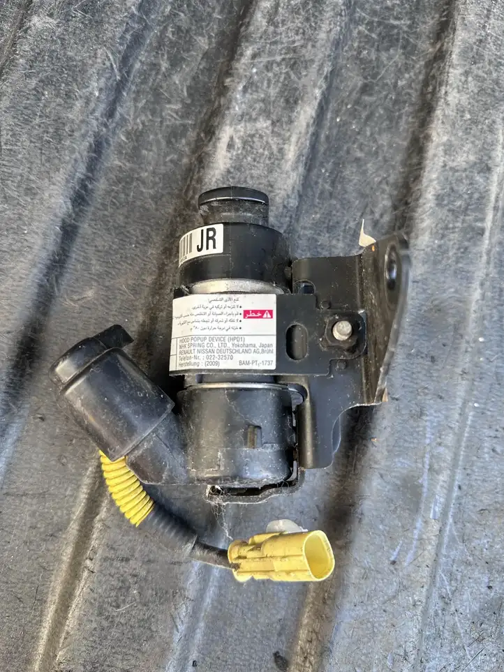 (2012 - ) 253441ME0A Привод подушки безопасности пешехода — фото 1