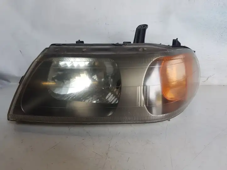 Mitsubishi Pajero Sport I (1996 - 2004) 10087415 Передняя фара — фото 1