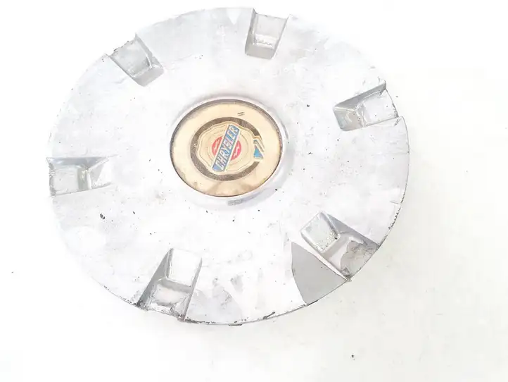 Chrysler Voyager (1996 - 2001)  04743123AA Заводская крышка (крышки) от центрального отверстия колеса