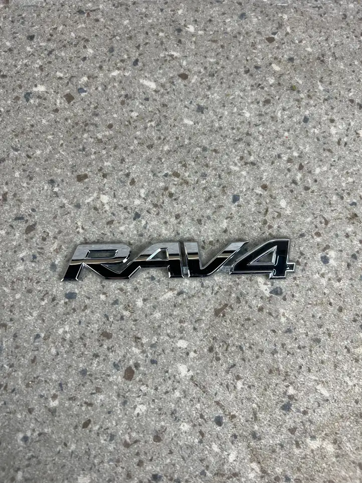 Toyota RAV 4 (XA40) (2012 - 2018) 7543142160 Эмблема модели — фото 1