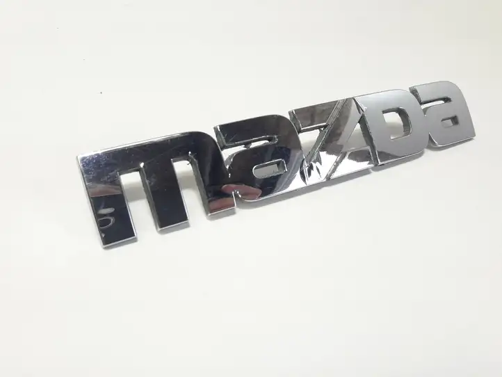 Mazda Premacy (1999 - 2005) 10051710 Эмблема производителя — фото 4
