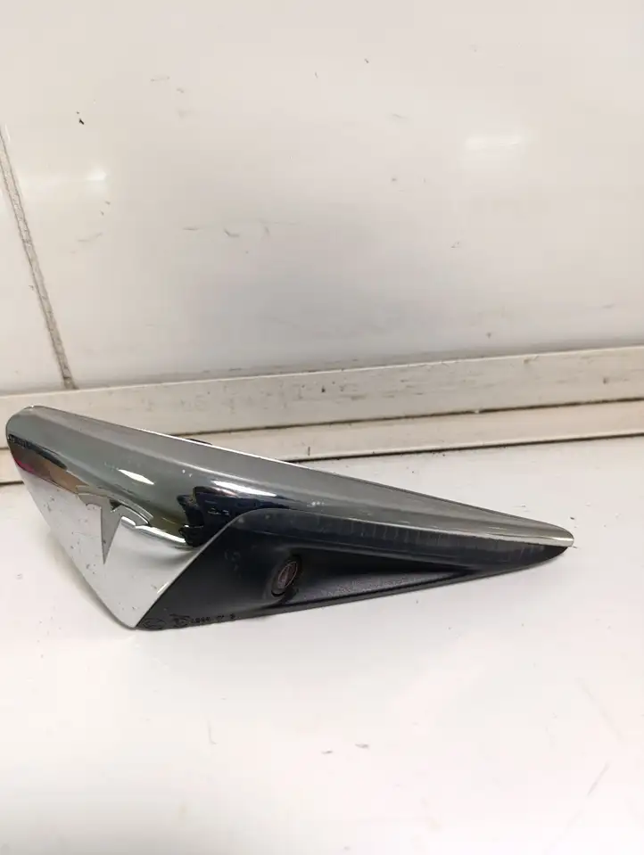 Tesla Model S (2016 - 2021) 103434488A Боковая камера в крыле — фото 1