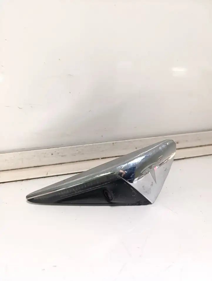 Tesla Model S (2016 - 2021) 103434588A Боковая камера в крыле — фото 1
