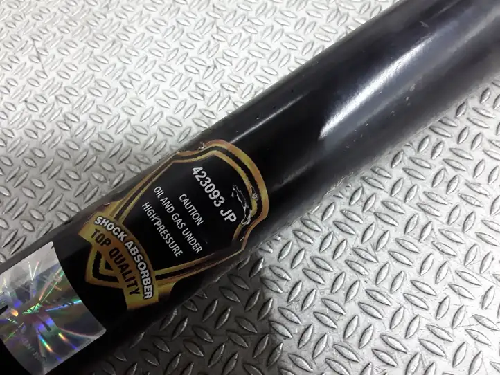 Nissan Primera (2001 - 2008)  423093JP Задний амортизатор с пружиной