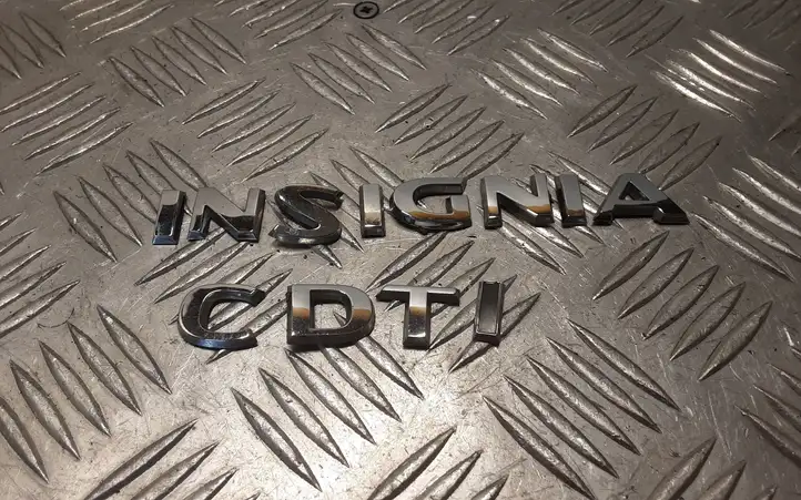 Opel Insignia A (2008 - 2017) Эмблема производителя — фото 1