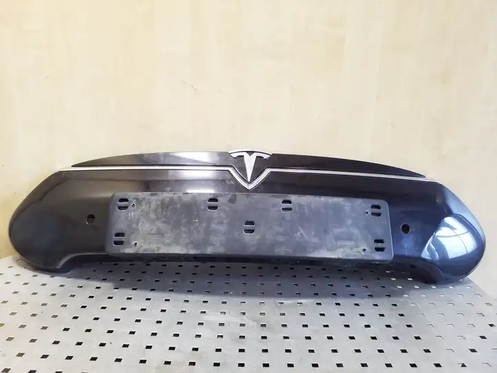 Tesla Model S (2016 - 2021) 102331200A Молдинг переднего бампера — фото 1