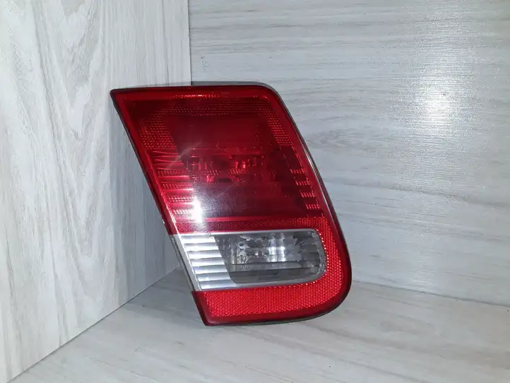 Saab 9-3 Ver2 (2003 - 2007) Задний фонарь в крышке багажника — фото 1